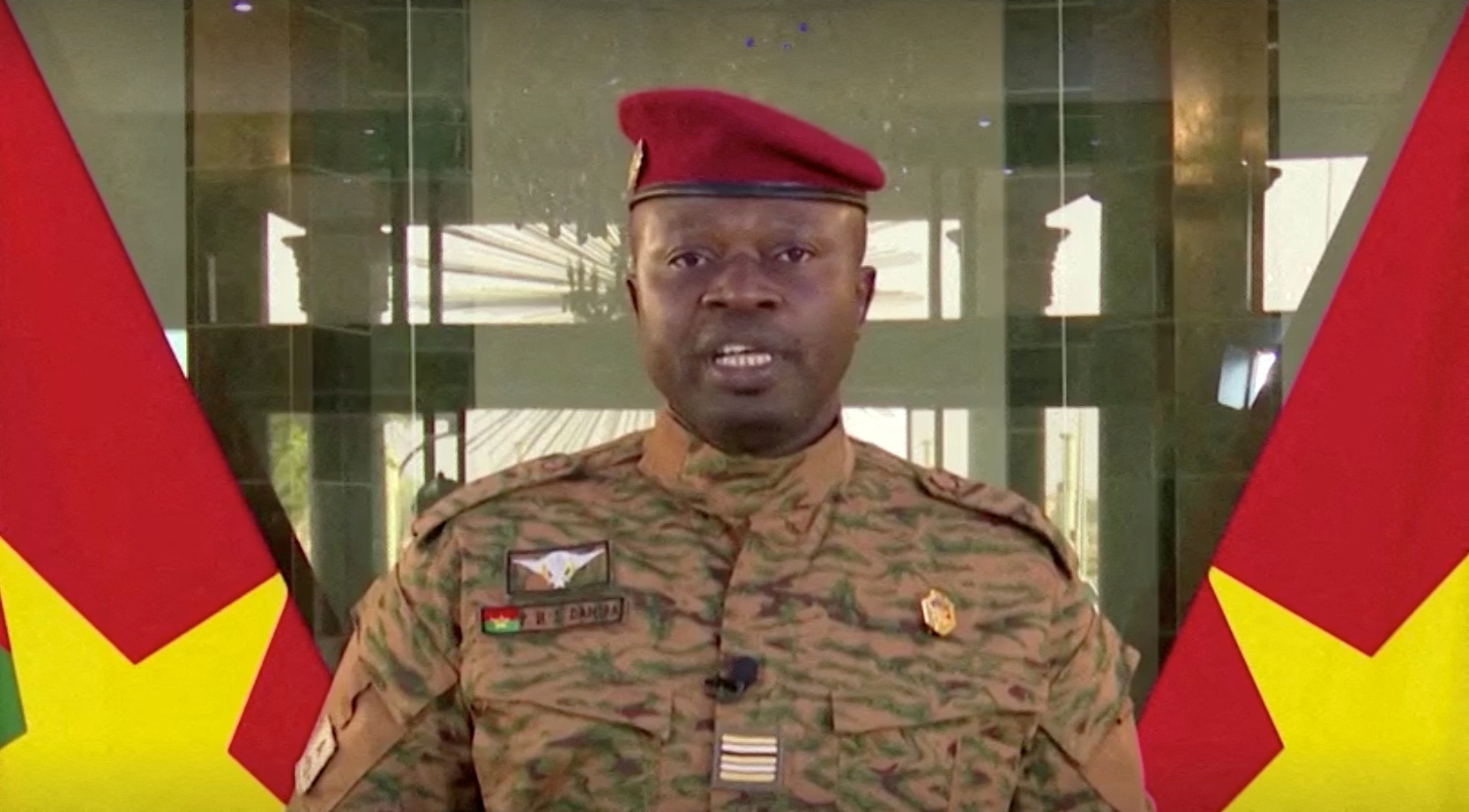 FILE PHOTO: The new military ruler of Burkina Faso, Lieutenant Colonel Paul-Henri Damiba, delivers a speech in Ouagadougou, Burkina Faso, January 27, 2022, in this screengrab taken from video
