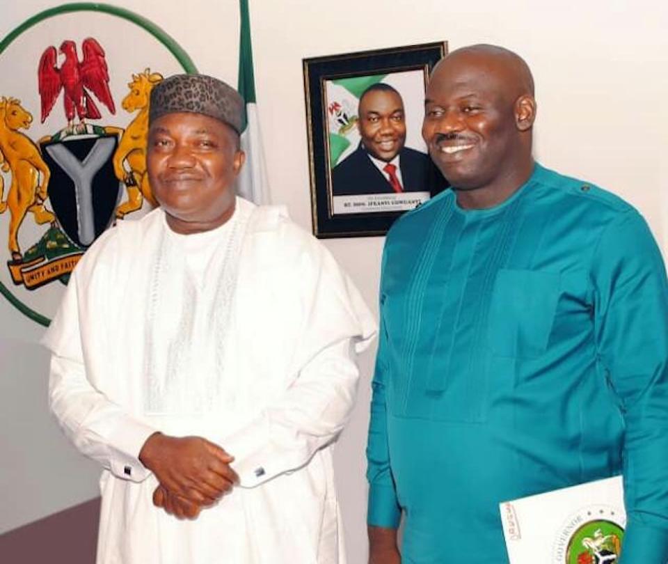 Governor Ifeanyi Ugwuanyi (L), Steve Oruruo (R)