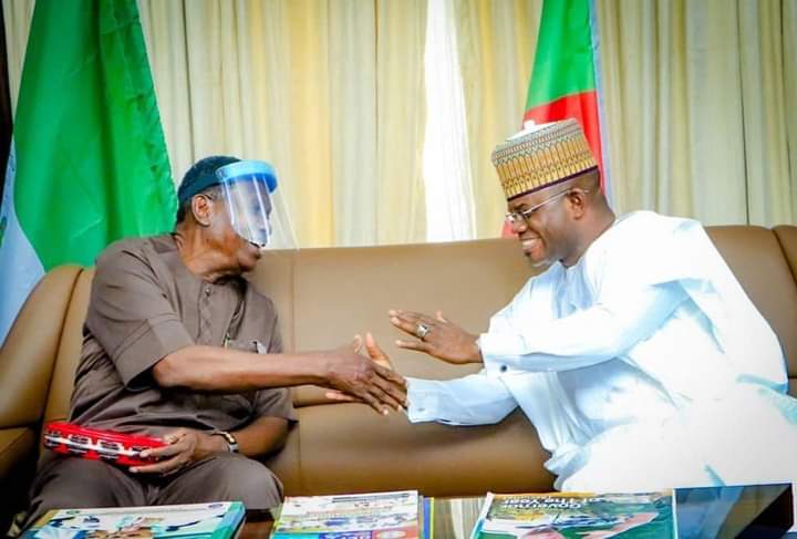 Pastor Enoch Adeboye (L), Governor Yahaya Bello (R)