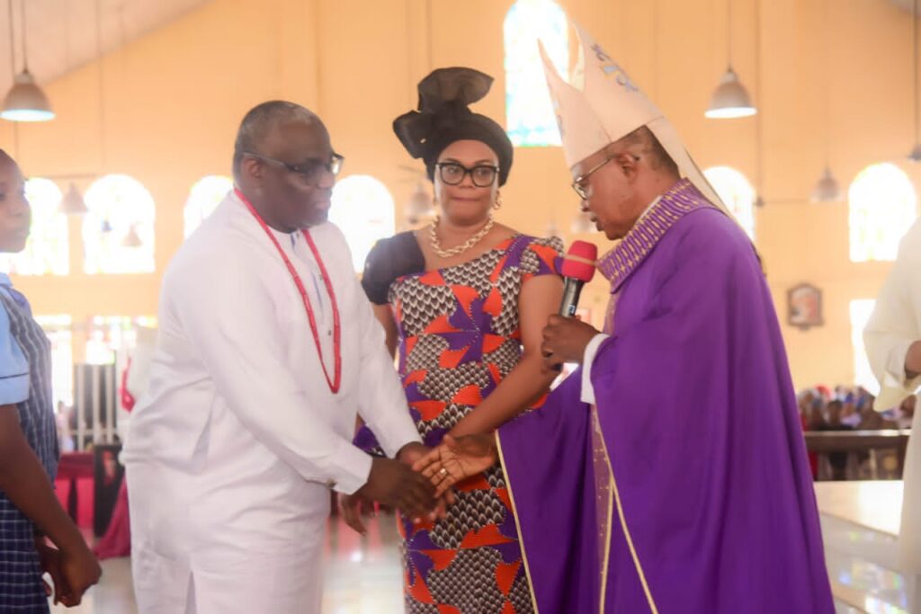 High Chief Nwabueze and wife handing over the school keys to the Archbishop