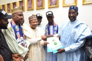 Senator Uba Sani (2nd L)
