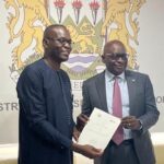 Mr Emmanuel Iza, Xejet CEO (left) and Hon Kabineh M Kallon, Honourable Minister of Transport and Aviation, during the signing of the MoU in Freetown, Sierra Leone