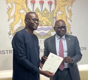 Mr Emmanuel Iza, Xejet CEO (left) and Hon Kabineh M Kallon, Honourable Minister of Transport and Aviation, during the signing of the MoU in Freetown, Sierra Leone