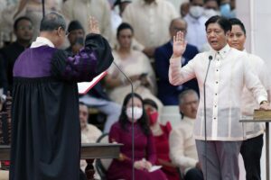 President-elect Ferdinand “Bongbong” Marcos Jr., right, is sworn in by Supreme Court Chief Justice Alexander Gesmundo during the inauguration ceremony at National Museum on Thursday, June 30, 2022 in Manila, Philippines. Marcos was sworn in as the country’s 17th president. (AP Photo/Aaron Favila)