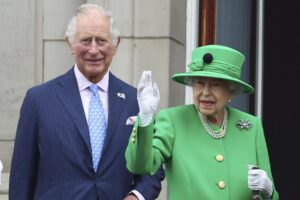 FILE – Britain’s Prince Charles, and Queen Elizabeth II appear on the balcony of Buckingham Palace during the Platinum Jubilee Pageant outside Buckingham Palace in London June 5, 2022, on the last of four days of celebrations to mark the Platinum Jubilee. Prince Charles, representing the Queen as the ceremonial head of the Commonwealth, is also expected to champion the bloc’s global climate action. Commonwealth leaders are set to adopt the much-awaited “Living Lands Charter”, an action plan to address climate change, land degradation and biodiversity loss. (Hannah McKay/Pool Photo via AP, File)