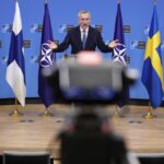 FILE – NATO Secretary General Jens Stoltenberg, center, participates in a media conference with Finland’s Foreign Minister Pekka Haavisto, left, and Sweden’s Foreign Minister Ann Linde, right, at NATO headquarters in Brussels, Monday, Jan. 24, 2022. (AP Photo/Olivier Matthys, File)