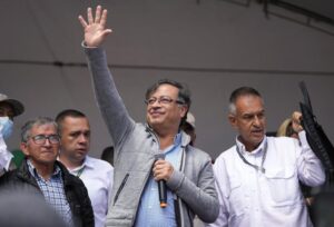 FILE – Then-Historical Pact coalition presidential candidate Gustavo Petro waves at supporters during a closing campaign rally in Zipaquira, Colombia, May 22, 2022. Petro, Colombia’s first elected leftist president, will take office in August with ambitious proposals to halt the record-high rates of deforestation in the Amazon. (AP Photo/Fernando Vergara, File)
