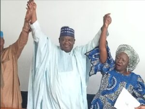 Barr Mutfwang introducing his running mate, Mrs Josephine Piyo