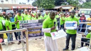 Leader of the groups addressing reporters in Benin City during their rally