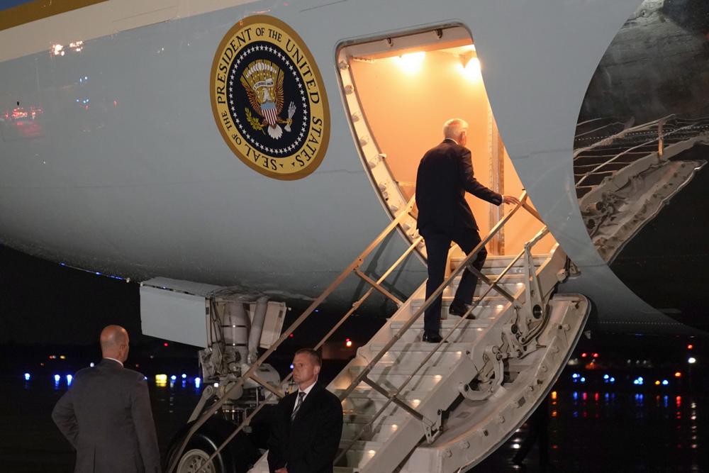 President Joe Biden boards Air Force One for a trip to Israel and Saudi Arabia, Tuesday, July 12, 2022, at Andrews Air Force Base, Md. (AP Photo/Evan Vucci)