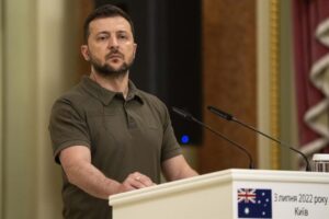 FILE – Ukrainian President Volodymyr Zelenskyy stands at the podium during a joint news conference with Australian Prime Minister Anthony Albanese, in Kyiv, Ukraine, July 3, 2022. (AP Photo/Nariman El-Mofty, File)