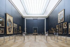 The Mona Lisa hangs inside the Louvre Museum in Paris, Tuesday, July 26, 2022. The museum benefits from one of Paris’ best-kept secrets, an underground cooling system that’s helped the Louvre cope with the sweltering heat that has broken temperature records across Europe. (AP Photo/Lewis Joly)