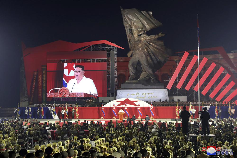 In this photo provided by the North Korean government, North Korean leader Kim Jong Un delivers his speech during a ceremony to mark the 69th anniversary of the signing of the ceasefire armistice that ends the fighting in the Korean War, in Pyongyang, North Korea Wednesday, July 27, 2022. Independent journalists were not given access to cover the event depicted in this image distributed by the North Korean government. The content of this image is as provided and cannot be independently verified. Korean language watermark on image as provided by source reads: “KCNA” which is the abbreviation for Korean Central News Agency. (Korean Central News Agency/Korea News Service via AP)