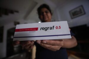 Jeewanthi Fernando, a patient who underwent a renal transplant shows a carton of an essential medical drug used to prevent rejection of the transplanted organ at her residence in Moratumulla, a suburb in Colombo, Sri Lanka, June 3, 2022. Doctors in Sri Lanka are urging their patients not to fall ill or get into accidents as the country’s economic crisis leaves its trusted health system without medicines and other vital supplies. Sri Lanka has run short of money to pay for basic imports like fuel and food, and medicine has also run scarce. (AP Photo/Eranga Jayawardena)