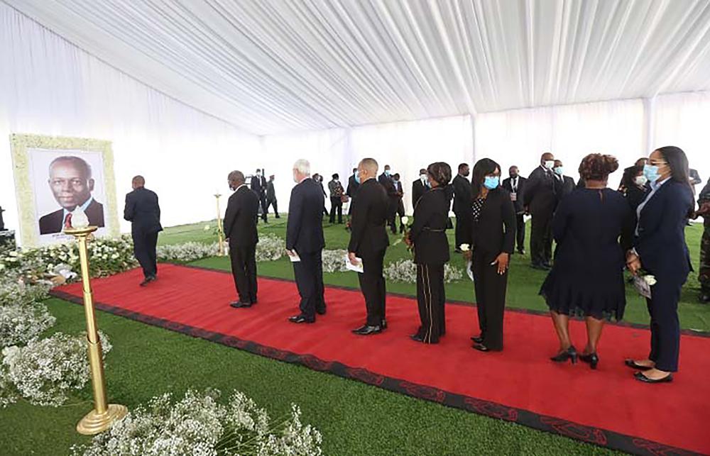 People pay their last respects to former Angolan President, Jose Eduardo dos Santos in Luanda, Angola, Monday July 11, 2022 Dos Santos died last week in Barcelona at the age of 79. (AP Photo)