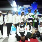 Zimbabwean high school World and European moot court competition champions pose for a photo as they arrive back at the Robert Mugabe International airport in Harare, Thursday, July, 7, 2022. A history-making team of Zimbabwean high school students that became world and European moot court competition champions has been widely praised in a country where the education system is beset by poor funding, lack of materials and teachers’ strikes. (AP Photo/Tsvangirayi Mukwazhi)