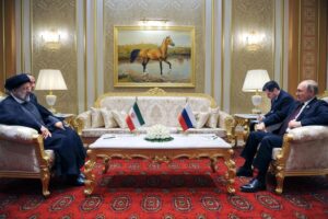 FILE – Russian President Vladimir Putin, right, speaks to Iran’s President Ebrahim Raisi on the sideline of the summit of Caspian Sea littoral states in Ashgabat, Turkmenistan, on June 29, 2022. Putin’s visit to Iran starting Tuesday, July 19, is intended to deepen ties with regional heavyweights as part of Moscow’s challenge to the United States and Europe amid its grinding campaign in Ukraine. (Mikhail Klimentyev, Sputnik, Kremlin Pool Photo via AP, File)