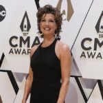 FILE – Amy Grant arrives at the 55th annual CMA Awards on Nov. 10, 2021, at the Bridgestone Arena in Nashville, Tenn. (AP Photo/Ed Rode, File)
