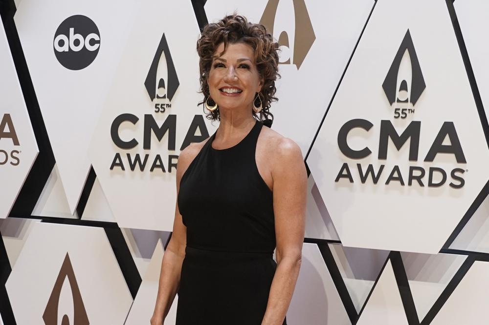 FILE – Amy Grant arrives at the 55th annual CMA Awards on Nov. 10, 2021, at the Bridgestone Arena in Nashville, Tenn. (AP Photo/Ed Rode, File)