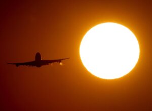 FILE – A Boeing 747 takes off from the airport in Frankfurt, Germany, on Aug. 7, 2020. Airplanes are a minor contributor to global greenhouse-gas emissions, but their share is sure to grow as more people travel in coming years, and that has the aviation industry facing the prospect of tighter environmental regulations and higher costs. At the opening of a huge aviation industry show near London, on Monday, July 18, 2022, discussion about climate change replaced much of the usual buzz over big airplane orders. (AP Photo/Michael Probst, File)