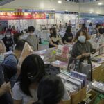 Japanese books are displayed at a booth during the annual book fair in Hong Kong, Wednesday, July 20, 2022. The Hong Kong Book Fair will be held on July 20-26. (AP Photo/Kin Cheung)