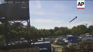 FILE – In this image taken from video and provided by the Ukrainian Presidential Press Office on Tuesday, June 28, 2022, claims to show the moment a missile struck the shopping mall in Kremenchuk. While much of the attritional war in Ukraine’s east is hidden from sight, the brutality of Russian missile strikes in recent days on the mall in the central city of Kremenchuk and on residential buildings in the capital, Kyiv, were in full view to the world and especially to Western leaders gathered for a trio of summits in Europe. (Ukrainian Presidential Press Office via AP, File)