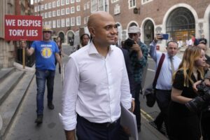 Conservative Member of Parliament Sajid Javid, one of the contenders to be the new leader of Britain’s ruling Conservative Party, leaves after a press conference in London, Monday, July 11, 2022. Candidates to replace Boris Johnson as Britain’s prime minister are scattering tax-cutting promises to their Conservative Party electorate, as party officials prepare Monday to quickly narrow the crowded field of more than ten candidates. (AP Photo/Frank Augstein)