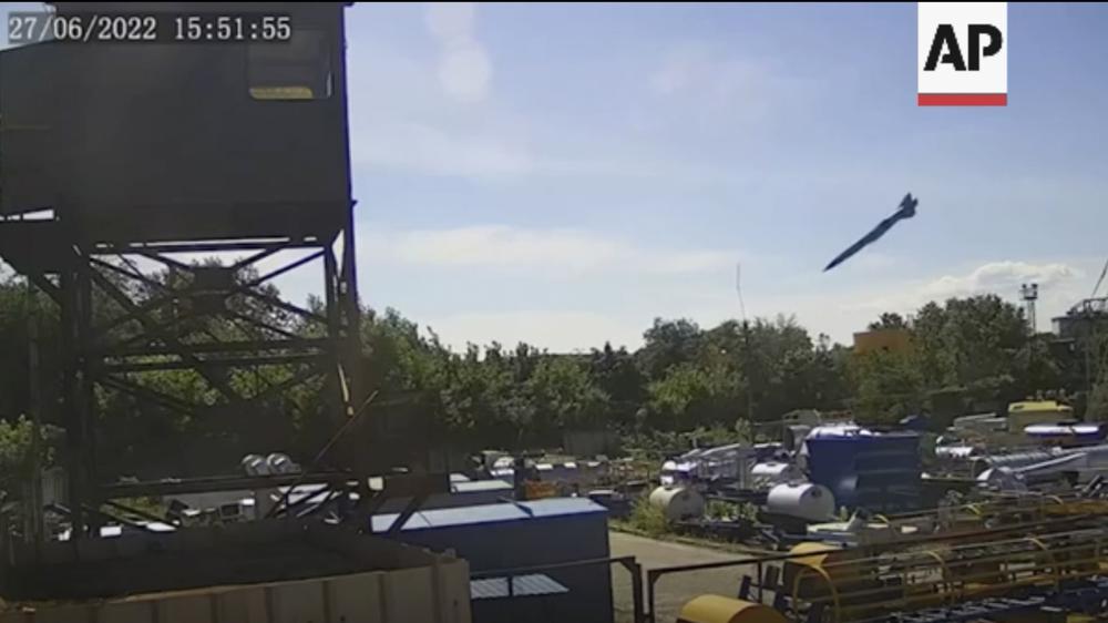 FILE – In this image taken from video and provided by the Ukrainian Presidential Press Office on Tuesday, June 28, 2022, claims to show the moment a missile struck the shopping mall in Kremenchuk. While much of the attritional war in Ukraine’s east is hidden from sight, the brutality of Russian missile strikes in recent days on the mall in the central city of Kremenchuk and on residential buildings in the capital, Kyiv, were in full view to the world and especially to Western leaders gathered for a trio of summits in Europe. (Ukrainian Presidential Press Office via AP, File)