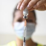 FILE – A health professional prepares a dose of a Monkeypox vaccine at the Edison municipal vaccination centre in Paris Wednesday July 27, 2022. Public health officials warn that moves by rich countries to buy large quantities of monkeypox vaccine, while declining to share doses with Africa, could leave millions of people unprotected against a more dangerous version of the disease and risk continued spillovers of the virus into humans. (Alain Jocard, Pool via AP, FIle)
