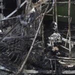 EDS NOTE: GRAPHIC CONTENT – A burned out body of Ukrainian military prisoner is seen in destroyed barrack at a prison in Olenivka, in an area controlled by Russian-backed separatist forces, eastern Ukraine, Friday, July 29, 2022. Russia and Ukraine accused each other Friday of shelling the prison in Olenivka in a separatist region of eastern Ukraine, an attack that reportedly killed dozens of Ukrainian military prisoners who were captured after the fall of a southern port city of Mariupol in May. (AP Photo)