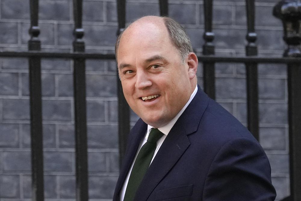 FILE – Britain’s Secretary of State for Defence Ben Wallace arrives for a cabinet meeting at 10 Downing Street in London, June 7, 2022. The contest to succeed British Prime Minister Boris Johnson has no single frontrunner but there are many prominent contenders. Wallace has won admirers for his straight talk, particularly among Conservative lawmakers who pressed for the U.K. to increase its defense spending. (AP Photo/Kirsty Wigglesworth, File)