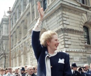 FILE – Britain’s Prime Minister Margaret Thatcher waves to the crowd after she was reelected as Britain’s Premier, in Downing Street, London, Friday, June 12, 1987. Two people are running to be Britain’s next prime minister, but a third presence looms over the contest: Margaret Thatcher. Almost a decade after her death, the late former prime minister casts a powerful spell over Britain’s Conservative Party. In the race to replace Boris Johnson as Conservative leader and prime minister, both Foreign Secretary Liz Truss and former Treasury chief Rishi Sunak claim to embody the values of Thatcher. (AP Photo/Dave Caulkin, File)