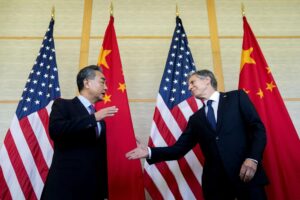 U.S. Secretary of State Antony Blinken, right, shakes hands with China’s Foreign Minister Wang Yi during a meeting in Nusa Dua on the Indonesian resort island of Bali Saturday, July 9, 2022. (Stefani Reynolds/Pool Photo via AP)