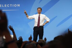 FILE – Conservative party leadership candidate Jeremy Hunt takes questions during a Conservative leadership hustings at ExCel Centre in London, July 17, 2019. The contest to succeed British Prime Minister Boris Johnson has no single frontrunner but there are many prominent contenders. Hunt, a former health secretary and foreign secretary, ran against Johnson in the 2019 leadership race, billing himself as the more serious candidate. He lost heavily, and was dumped from the Cabinet. (AP Photo/Frank Augstein, File)