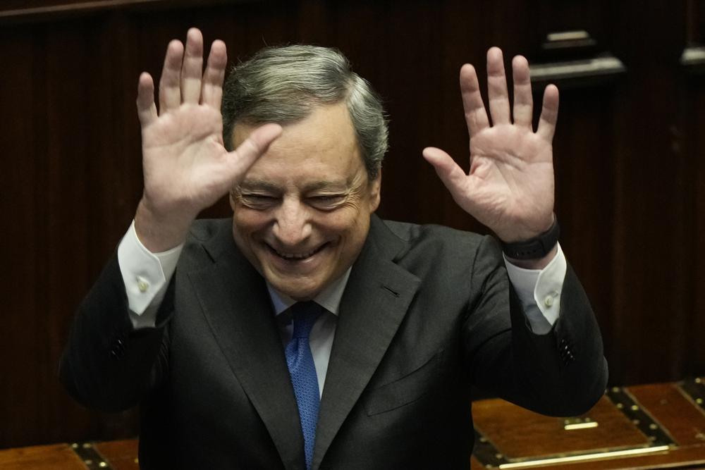 Italian Premier Mario Draghi waves to lawmakers at the end of his address at the Parliament in Rome, Thursday, July 21, 2022. Premier Mario Draghi’s national unity government headed for collapse Thursday after key coalition allies boycotted a confidence vote, signaling the likelihood of early elections and a renewed period of uncertainty for Italy and Europe at a critical time. (AP Photo/Andrew Medichini)