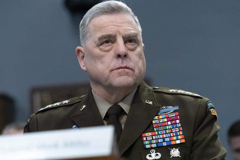 FILE – Chairman of the Joint Chiefs of Staff Gen. Mark Milley testifies before the House Committee on Appropriations Subcommittee on Defense during a hearing for the Fiscal Year 2023 Department of Defense, on Capitol Hill in Washington, May 11, 2022. The Chinese military has become significantly more aggressive and dangerous over the past five years, the top U.S. military officer said during a trip to the Indo-Pacific that included a stop Sunday, July 24, 2022, in Indonesia.(AP Photo/Jose Luis Magana, File)