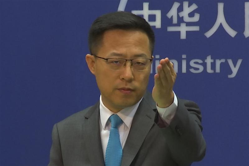 FILE – Chinese Foreign Ministry spokesperson Zhao Lijian gestures during a press conference at the Ministry of Foreign Affairs in Beijing on July 6, 2022. The United States is “the biggest threat to world peace, stability and development,” China said Thursday, July 7, continuing its sharp rhetoric in response to U.S. accusations of Chinese spying and threats to the international order.(AP Photo/Liu Zheng, File)