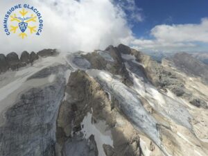 This undated image released on Monday, July 4, 2022, by the Glaciological Commission of the Tridentine Alpinists Society shows the Fedaia glacier in Italy’s Alps near Trento before a large chunk broke loose on Sunday, killing at least six hikers and injuring eight others. Drones were being used to spot any more bodies because conditions downslope from the glacier, which has been melting for decades, were still too unstable to immediately send rescuers and dogs into the area to look for others buried under tons of debris. (Cristian Ferrari/ Commissione Glaciologica Società Alpinisti Tridentini via AP)