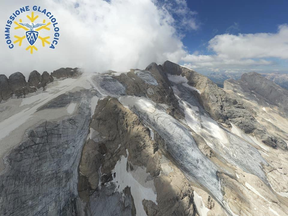 This undated image released on Monday, July 4, 2022, by the Glaciological Commission of the Tridentine Alpinists Society shows the Fedaia glacier in Italy’s Alps near Trento before a large chunk broke loose on Sunday, killing at least six hikers and injuring eight others. Drones were being used to spot any more bodies because conditions downslope from the glacier, which has been melting for decades, were still too unstable to immediately send rescuers and dogs into the area to look for others buried under tons of debris. (Cristian Ferrari/ Commissione Glaciologica Società Alpinisti Tridentini via AP)