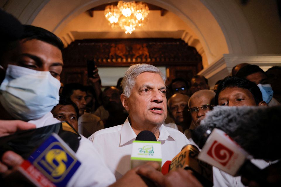 FILE PHOTO – Ranil Wickremesinghe who has been elected as the Eighth Executive President under the Constitution speaks to media as he leaves a Buddhist temple, amid the country’s economic crisis, in Colombo, Sri Lanka July 20, 2022. REUTERS/ Dinuka Liyanawatte