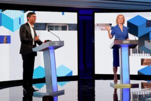 Candidates Rishi Sunak and Liz Truss take part in the BBC Conservative party leadership debate at Victoria Hall in Hanley, Stoke-on-Trent, Britain, July 25, 2022. Jacob King/Pool via REUTERS