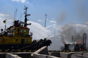 Firefighters work at a site of a Russian missile strike in a sea port of Odesa, as Russia’s attack on Ukraine continues, Ukraine July 23, 2022. Press service of the Joint Forces of the South Defence/Handout via REUTERS