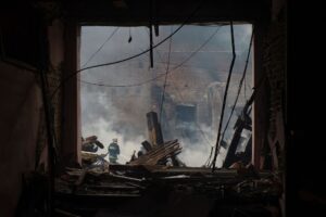 A firefighter works at a site of a professional college that was heavily damaged by a Russian missile strike, as Russia’s attack on Ukraine continues, in Kharkiv, Ukraine July 30, 2022. REUTERS/Sofiia Gatilova