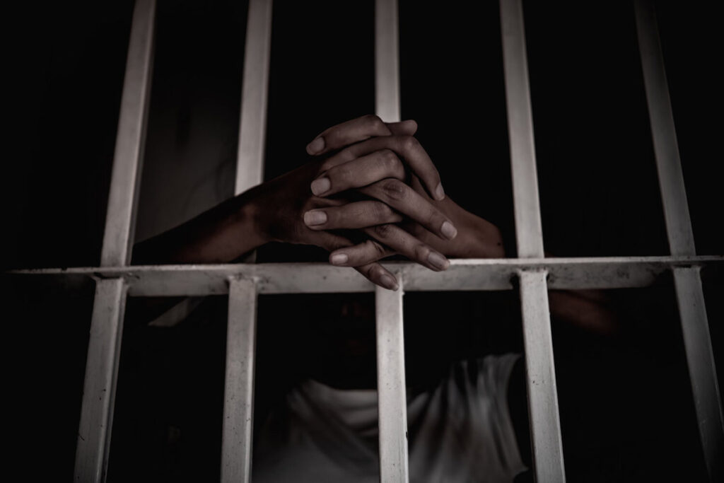 Hands,Of,Women,Desperate,To,Catch,The,Iron,Prison,prisoner,Concept,thailand