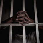 Hands,Of,Women,Desperate,To,Catch,The,Iron,Prison,prisoner,Concept,thailand