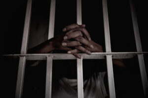 Hands,Of,Women,Desperate,To,Catch,The,Iron,Prison,prisoner,Concept,thailand