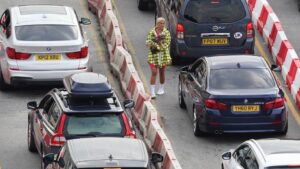 Holidaymakers and hauliers are being warned of another day of disruption at the Port of Dover and the Channel Tunnel after two days of gridlock.
