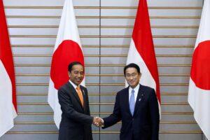 Joko Widodo, Indonesia’s President, and Fumio Kishida, Japan’s Prime Minister, shake hands during a summit meeting at the prime minister’s official residence in Tokyo, Japan, July 27, 2022. Kiyoshi Ota/Pool via REUTERS