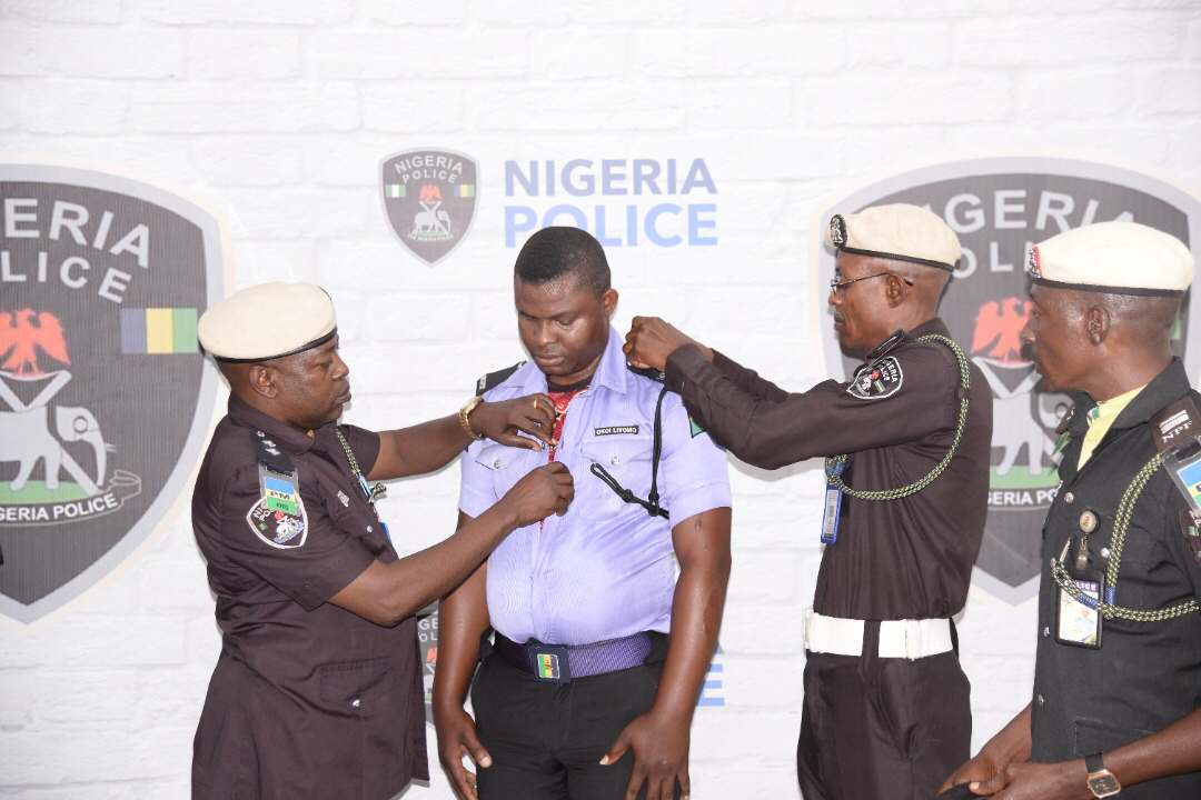 Policeman caught flogging man with machete in viral video fired