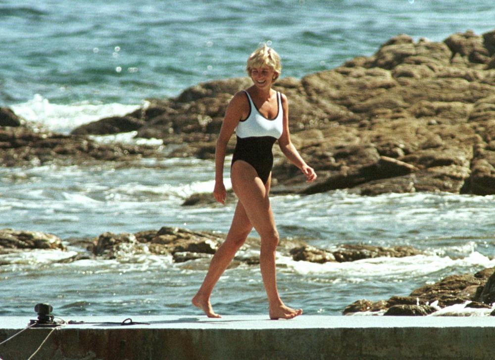 FILE – Britain’s Diana, Princess of Wales walks on the quay of the residence of Mohamed Al Fayed, in Saint Tropez, French Riviera, Sunday July 20, 1997. It has been nearly 25 years since Princess Diana died in a high-speed car crash in Paris. The French doctor who treated her at the scene has recounted what happened. Dr. Frederic Mailliez told The Associated Press how he tried to save her on that night of Aug. 31, 1997. (AP Photo/Lionel Cironneau, File)